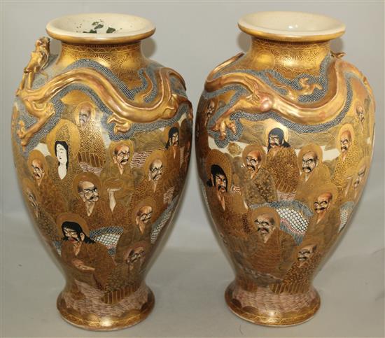 A pair of Japanese Satsuma pottery baluster vases, Meiji period, signed Hodota, 38.5cm